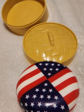 Round American Flag Compact with Yellow Basketweave Case Squish Toy